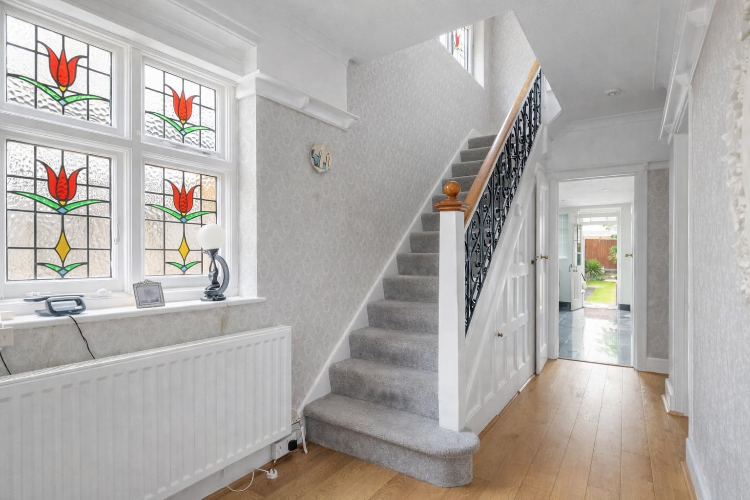 Entrance hall and staircase at Cleveland Park, W13